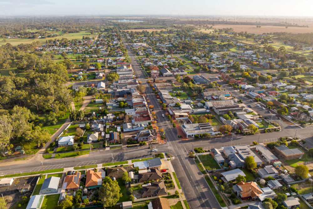 Aerial view over the main street and residential areas of a rural township - Australian Stock Image