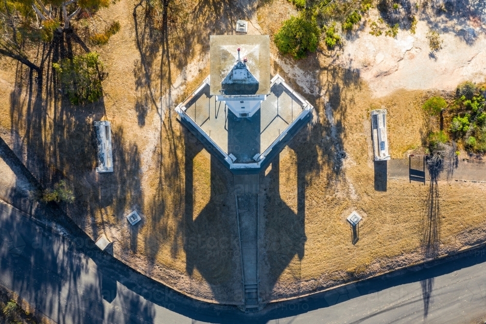 Aerial view over the top of a lookout tower on a hill top. - Australian Stock Image