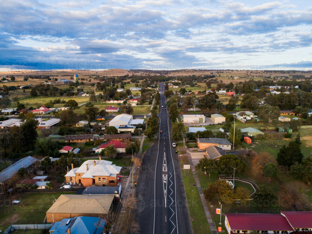 Aerial view road leading out of the country town of Merriwa in New South Wales Australia - Australian Stock Image
