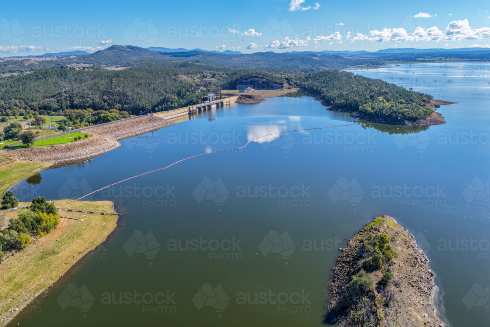 Aerial view showcasing the Lake Keepit dam wall and surrounding rural landscape - Australian Stock Image