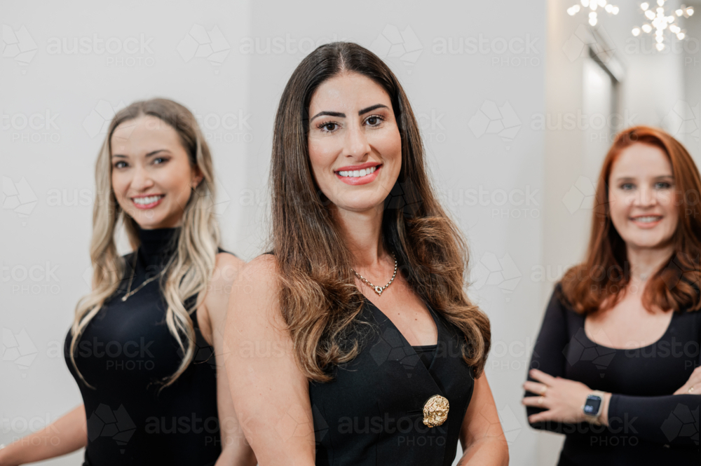 Aesthetic practitioners standing along the corridors in skin and laser clinic - Australian Stock Image