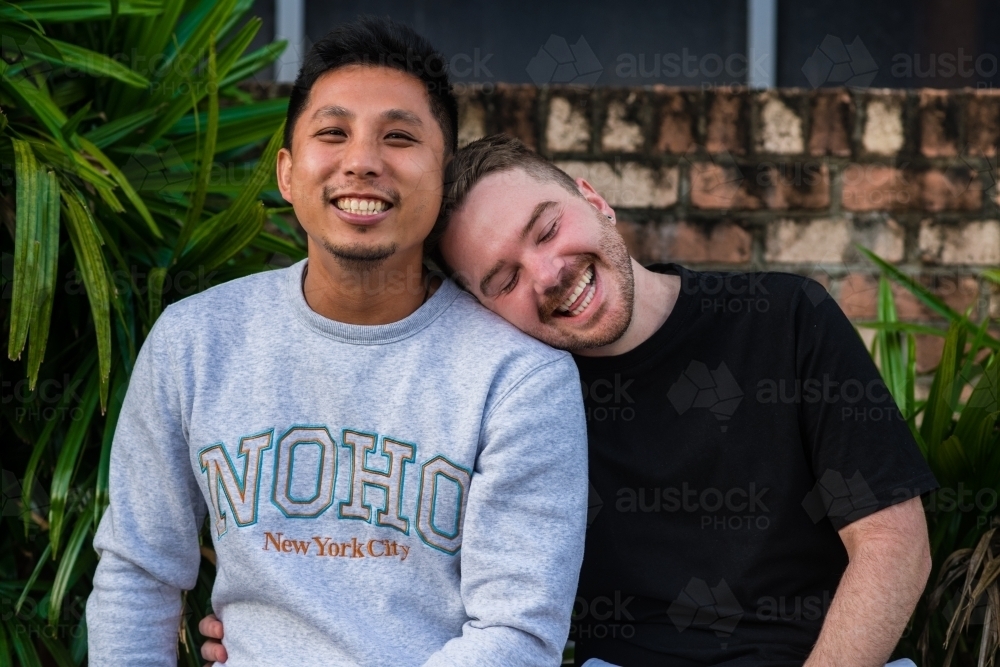 affectionate moment, gay couple - Australian Stock Image