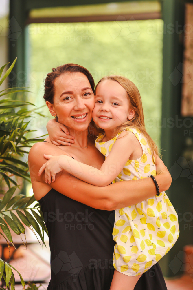 Affectionate mother and daughter portrait - Australian Stock Image