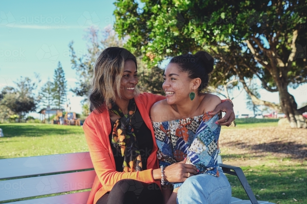 African mother and multicultural teen daughter - Australian Stock Image