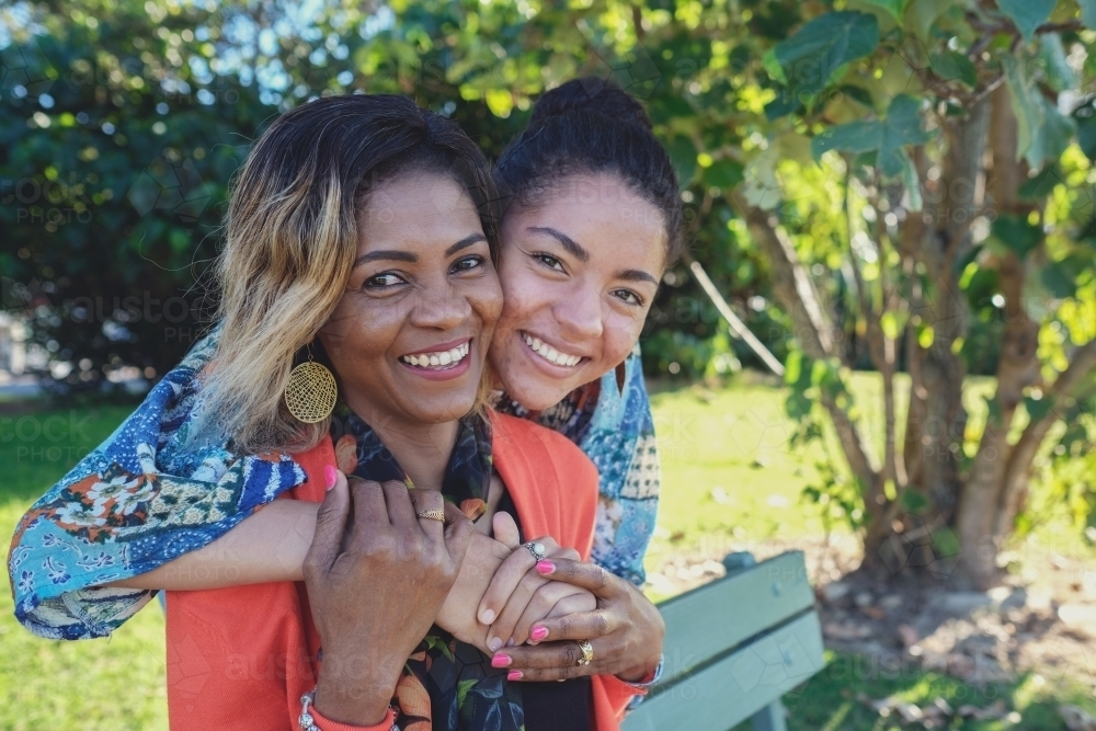 African mother and multicultural teen daughter - Australian Stock Image