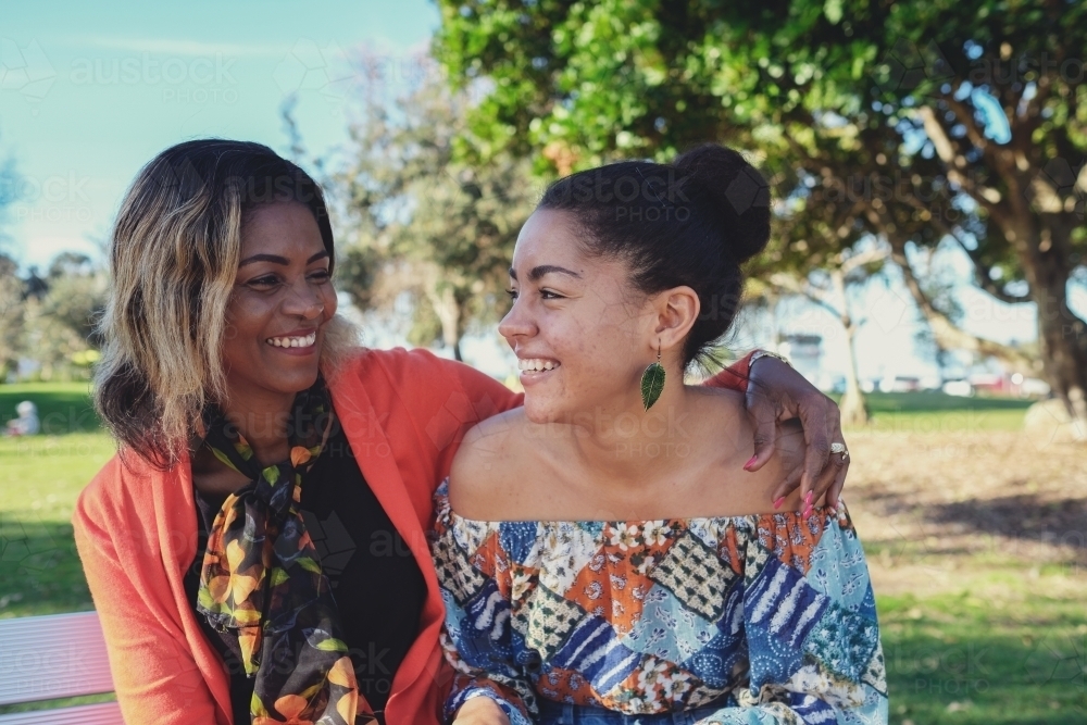 African mother and multicultural teen daughter - Australian Stock Image