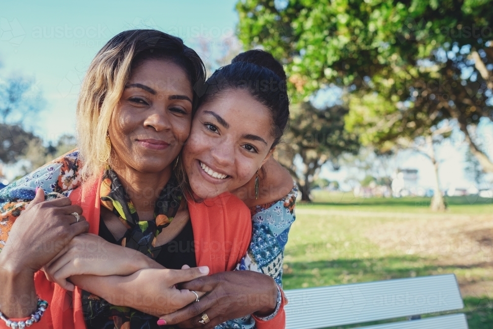 African mother and multicultural teen daughter - Australian Stock Image