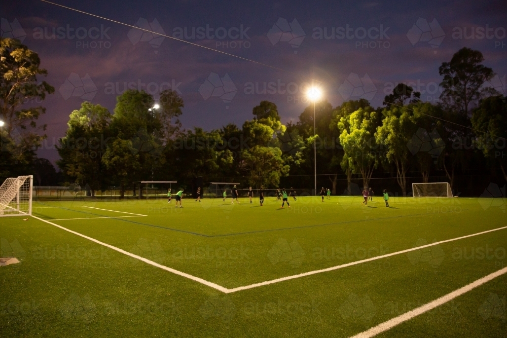 after dusk soccer training - Australian Stock Image