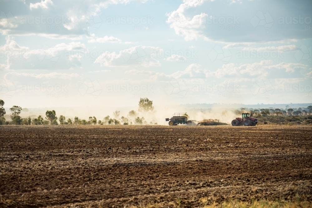 Agricultural landscape with tractor and air-seeder - Australian Stock Image