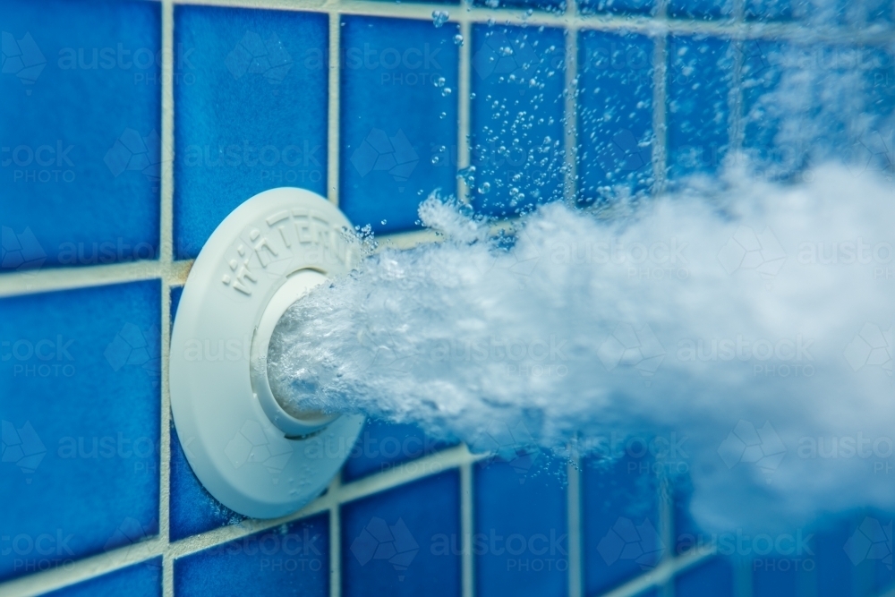 Image of Air blowing through a spa water jet Austockphoto