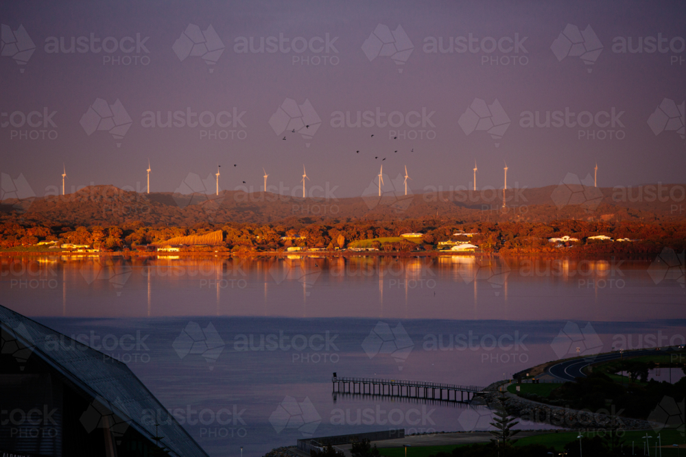 Albany Wind farm reflecting in the water of Princess Royal Harbour - Australian Stock Image