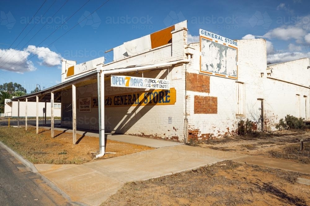 An abandoned general store on a street corner - Australian Stock Image