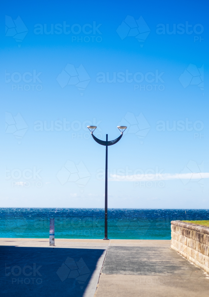 An art deco lightpost at Maroubra beach - Australian Stock Image