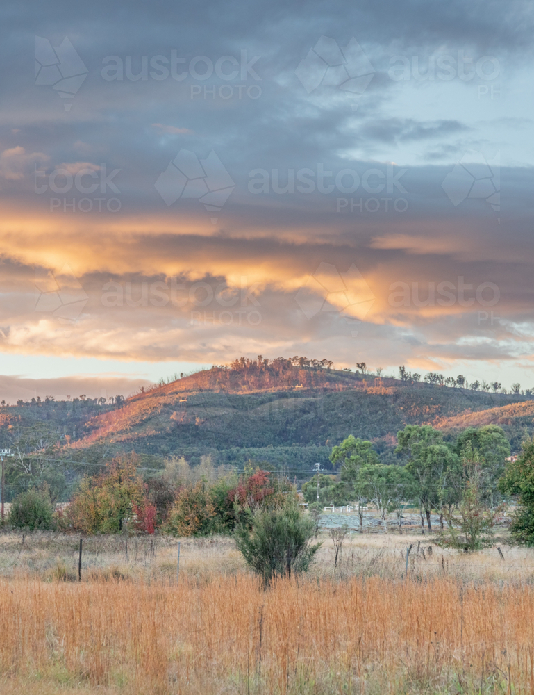 An early morning with first light on a hilltop - Australian Stock Image