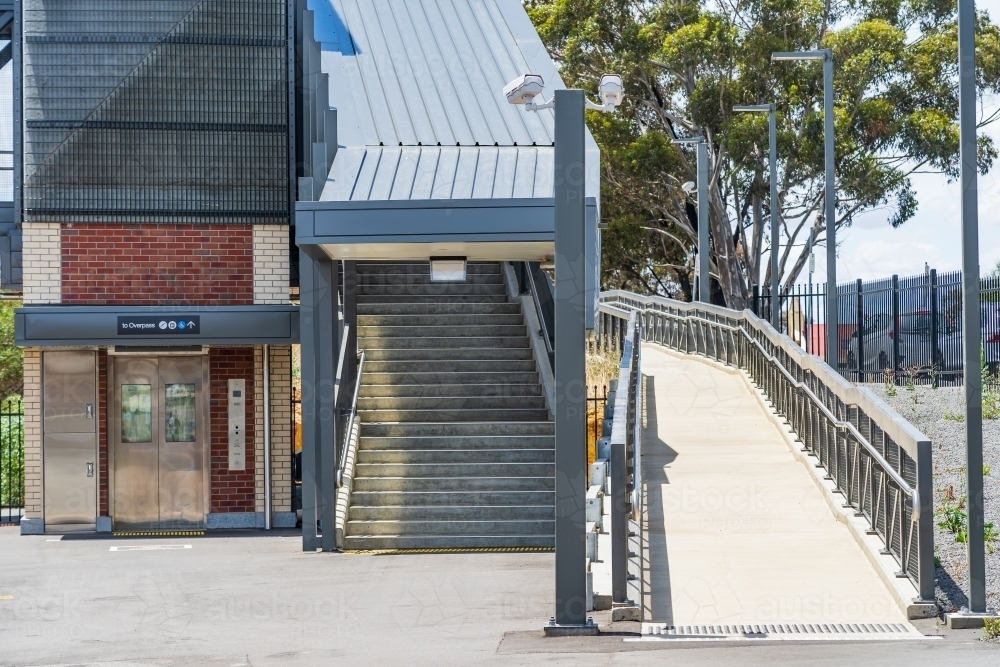 Image of An elevator, stairs and an access ramp at a regional railway ...