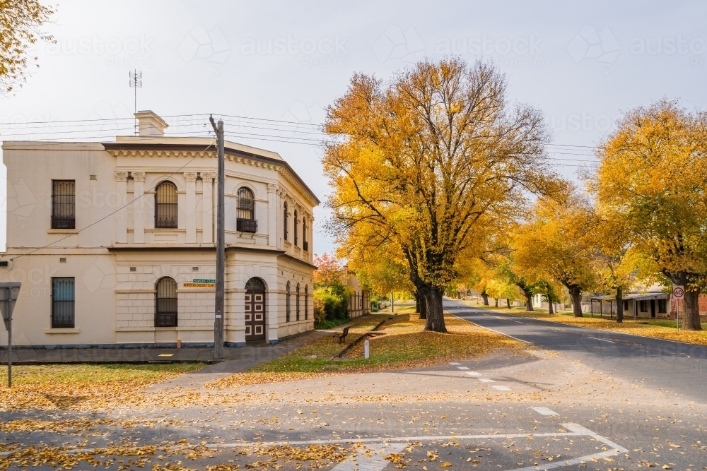 Image of An historic bank building on a street corner of a rural town ...