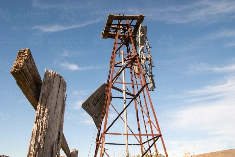 An old broken windmill on a farm in the country - Australian Stock Image