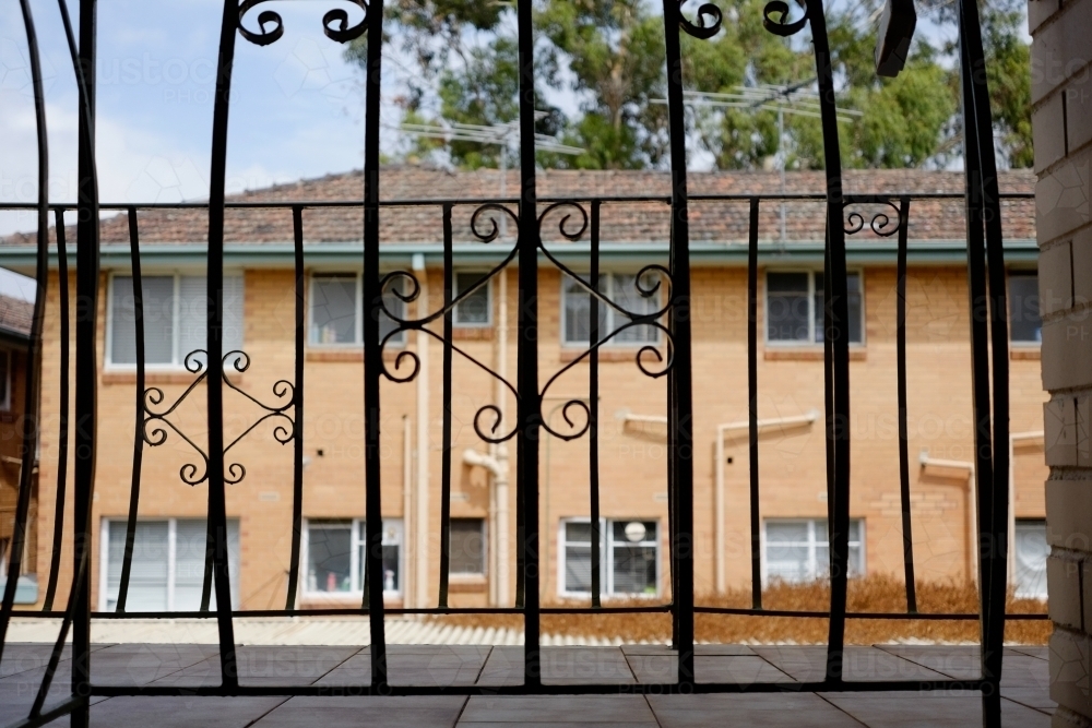 An old fashioned walkway in front of an apartment block - Australian Stock Image