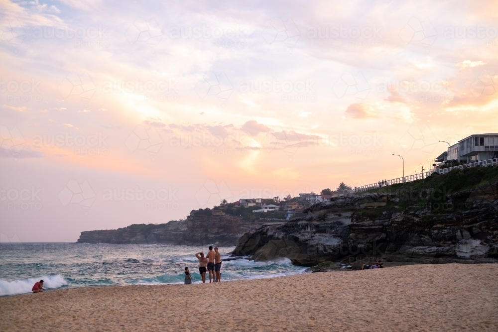an orange sunset at Tamarama beach - Australian Stock Image