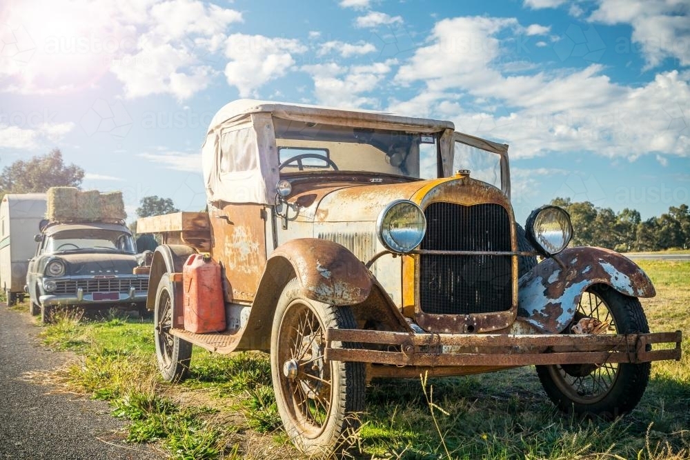 An vintage Ford car parked on the roadside - Australian Stock Image
