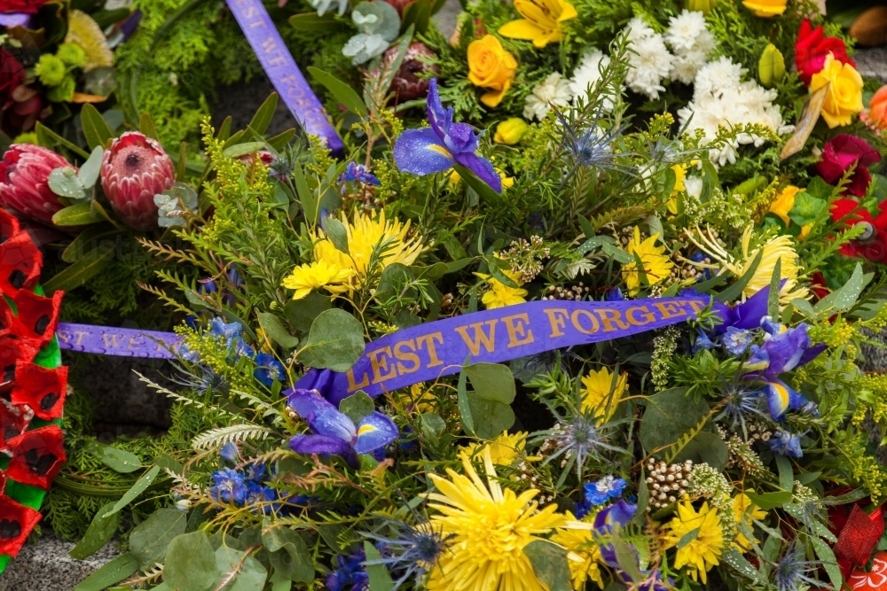 ANZAC day wreath with lest we forget ribbon laid on cenotaph - Australian Stock Image