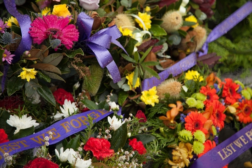ANZAC day wreath with lest we forget ribbon laid on cenotaph - Australian Stock Image