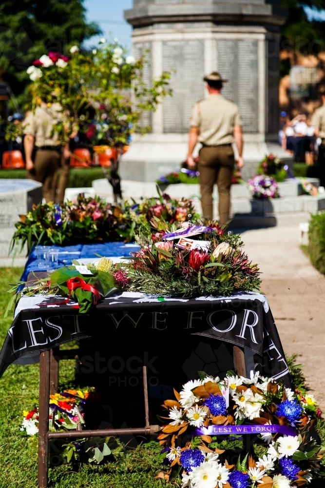 ANZAC day wreaths on table at memorial service - Australian Stock Image