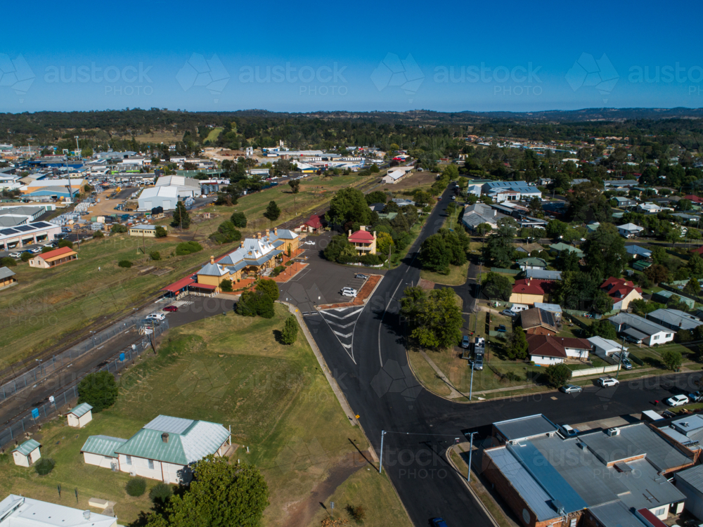 Armidale aerial streetscape in bright sunlight with train station in rural city - Australian Stock Image
