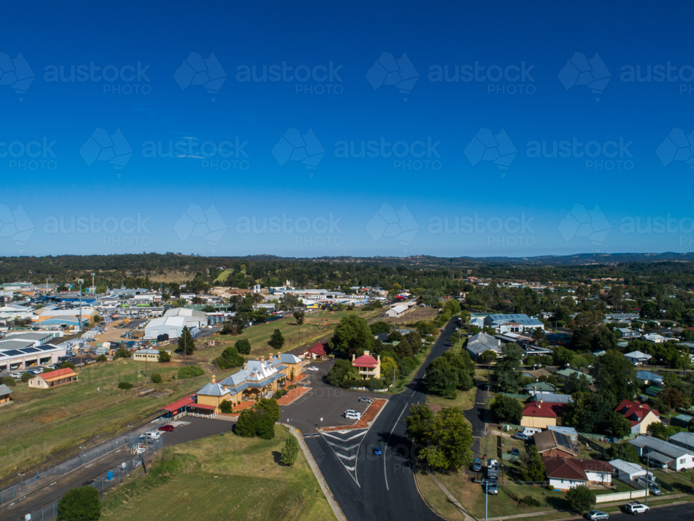 Armidale aerial streetscape in bright sunlight with train station in rural city - Australian Stock Image