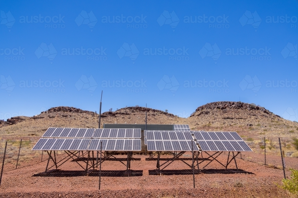array of solar panels in the Pilbara region of Western Australia - Australian Stock Image