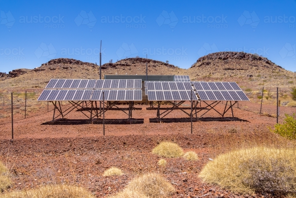 array of solar panels in the Pilbara region of Western Australia - Australian Stock Image