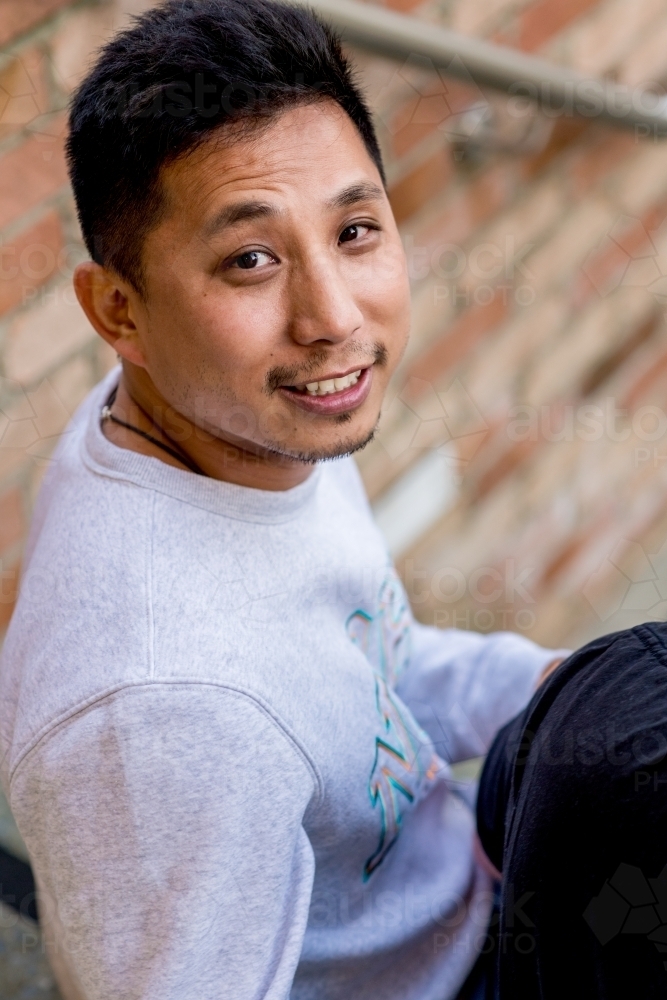 asian man smiling portrait - Australian Stock Image