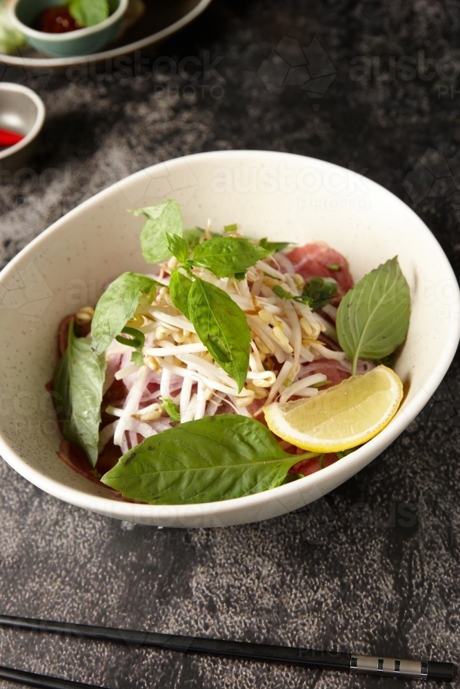 Asian soup ingredients in bowl - Australian Stock Image