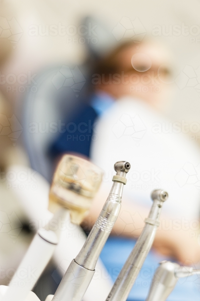 At the dentist, focus on the dental tools - Australian Stock Image