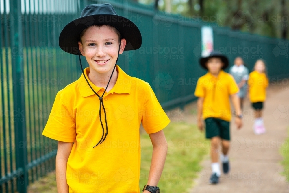 Aussie school boy with a hat outside - Australian Stock Image