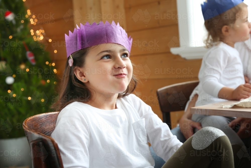 Girl smiling in Christmas hat - Australian Stock Image