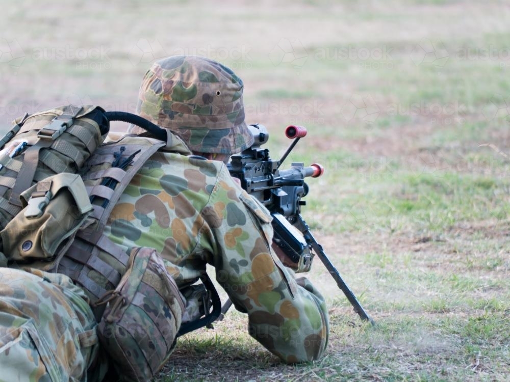 Australian Army Reserve Exercise - Soldier Lying with Gun - Australian Stock Image