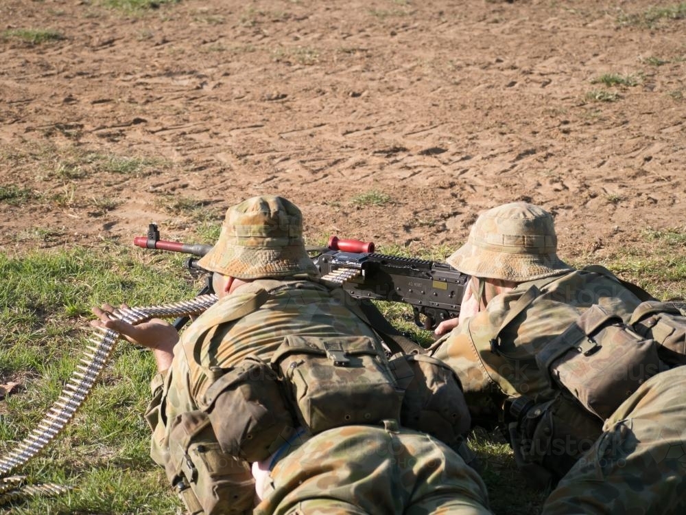 Australian Army Reserve Exercise - Two Soldiers Lying with Gun and Bullets - Australian Stock Image