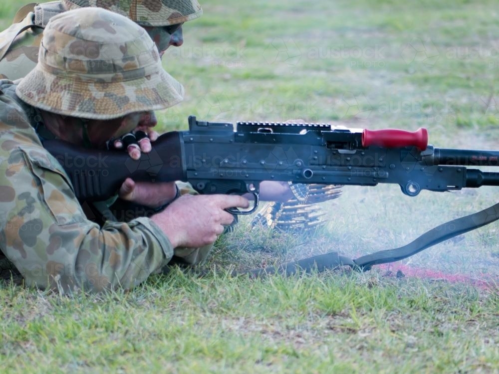 Australian Army Reserve Exercise - Two Soldiers Lying with Gun and Bullets - Australian Stock Image