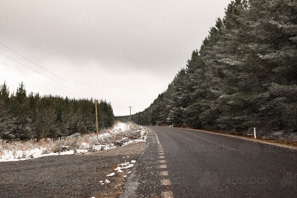 Australian country roads during snowy winter season at Shooters Hill, NSW Australia - Australian Stock Image