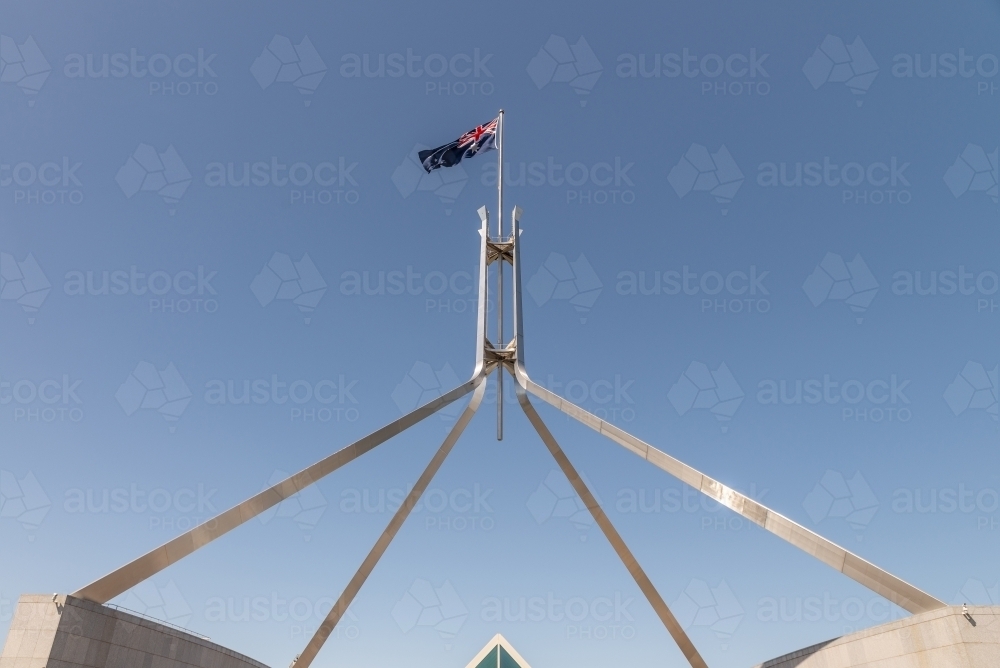 Australian flag above parliament House, Canberra - Australian Stock Image