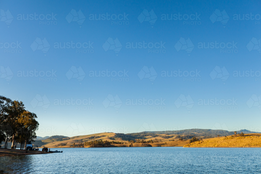 Australian lakeside landscape at Lake St Clair in Hunter Valley on summer afternoon - Australian Stock Image