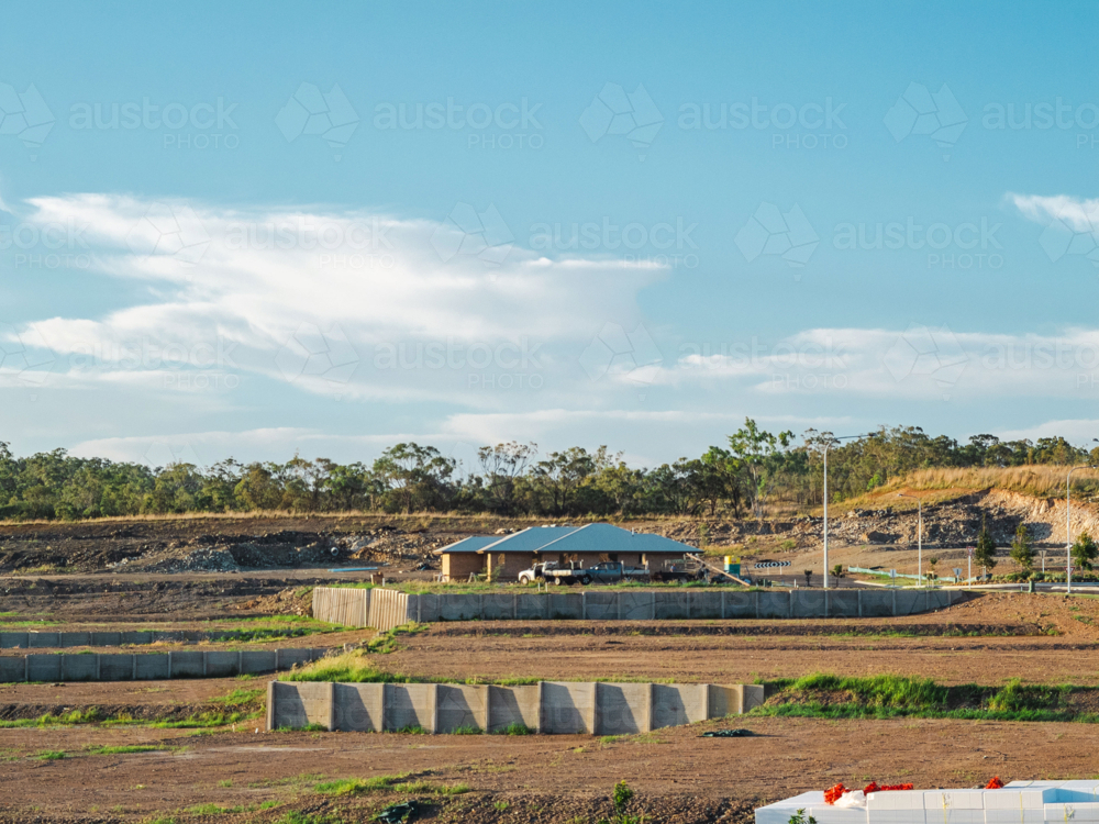 Australian land development with terraced earthworks and building - Australian Stock Image