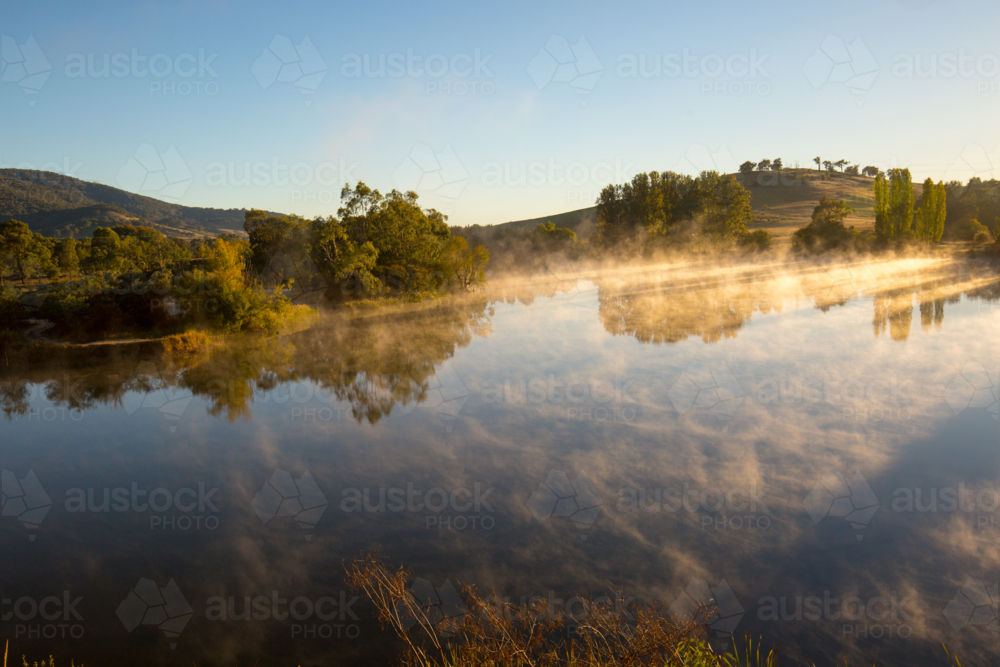 Australian landscape and misty lake on a cold morning in Allans Flat, near Yackandandah - Australian Stock Image