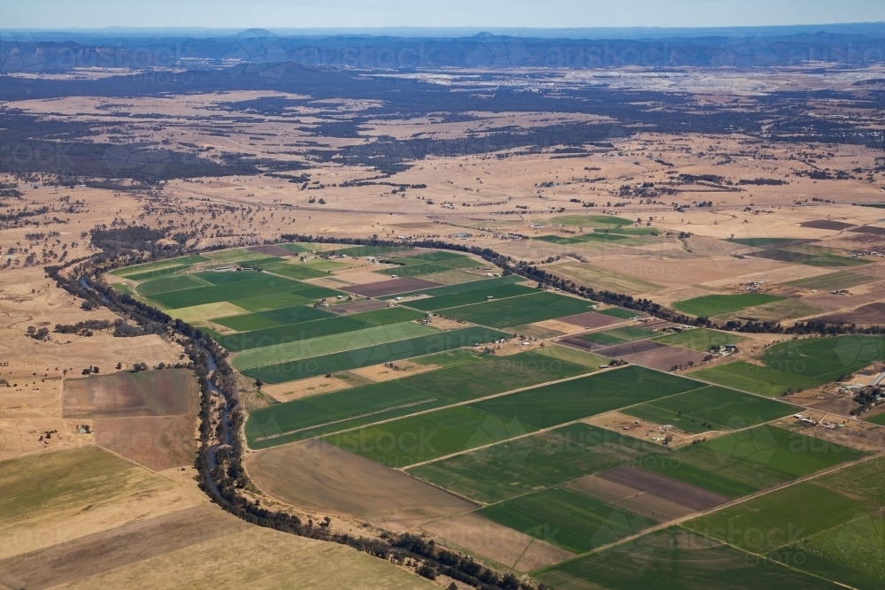 Image of Australian landscape of irrigated farm paddocks viewed from