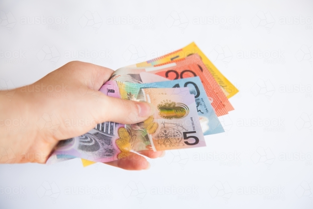 Australian money in bank notes, cash on white - Australian Stock Image