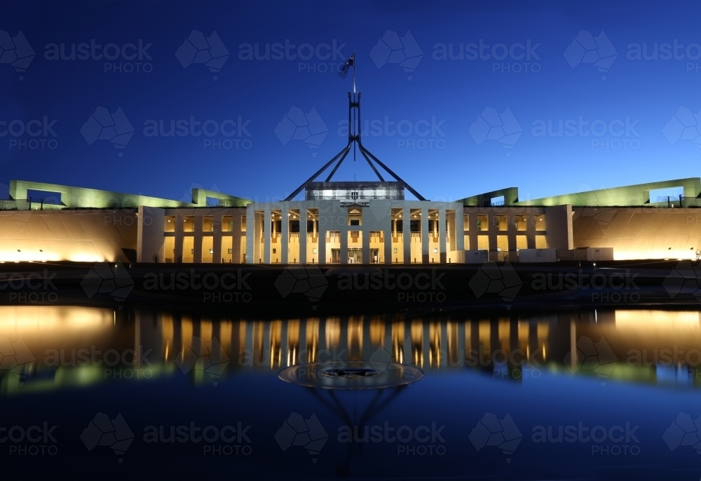Australian Parliament House and reflections on a clear night - Australian Stock Image