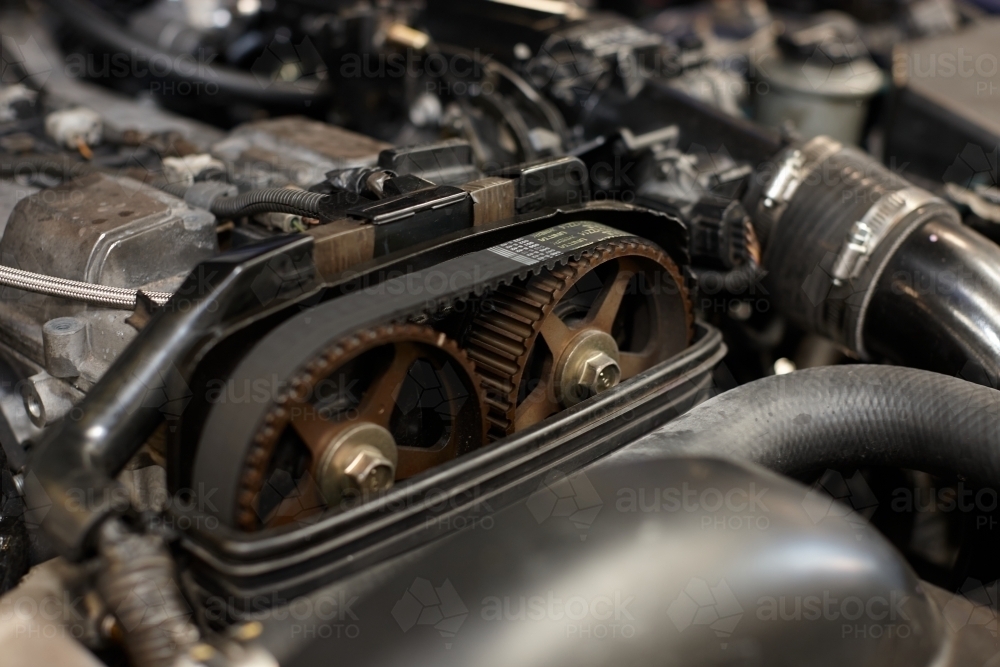 Automotive work on engine of vehicle - Australian Stock Image