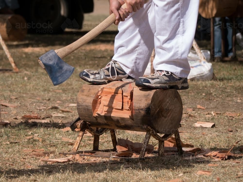 Axeman competing in a woodchop competition - Australian Stock Image