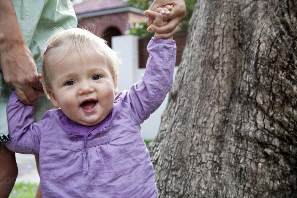 Baby girl smiling - Australian Stock Image